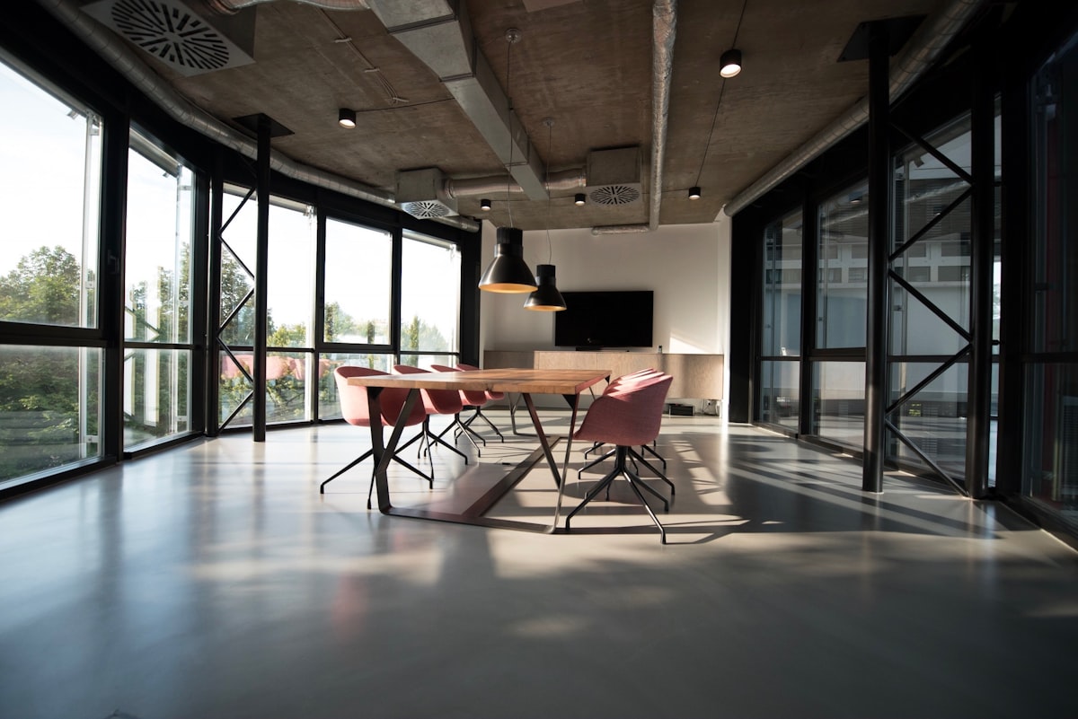 modern office desk setup laptop coffee taipei city view